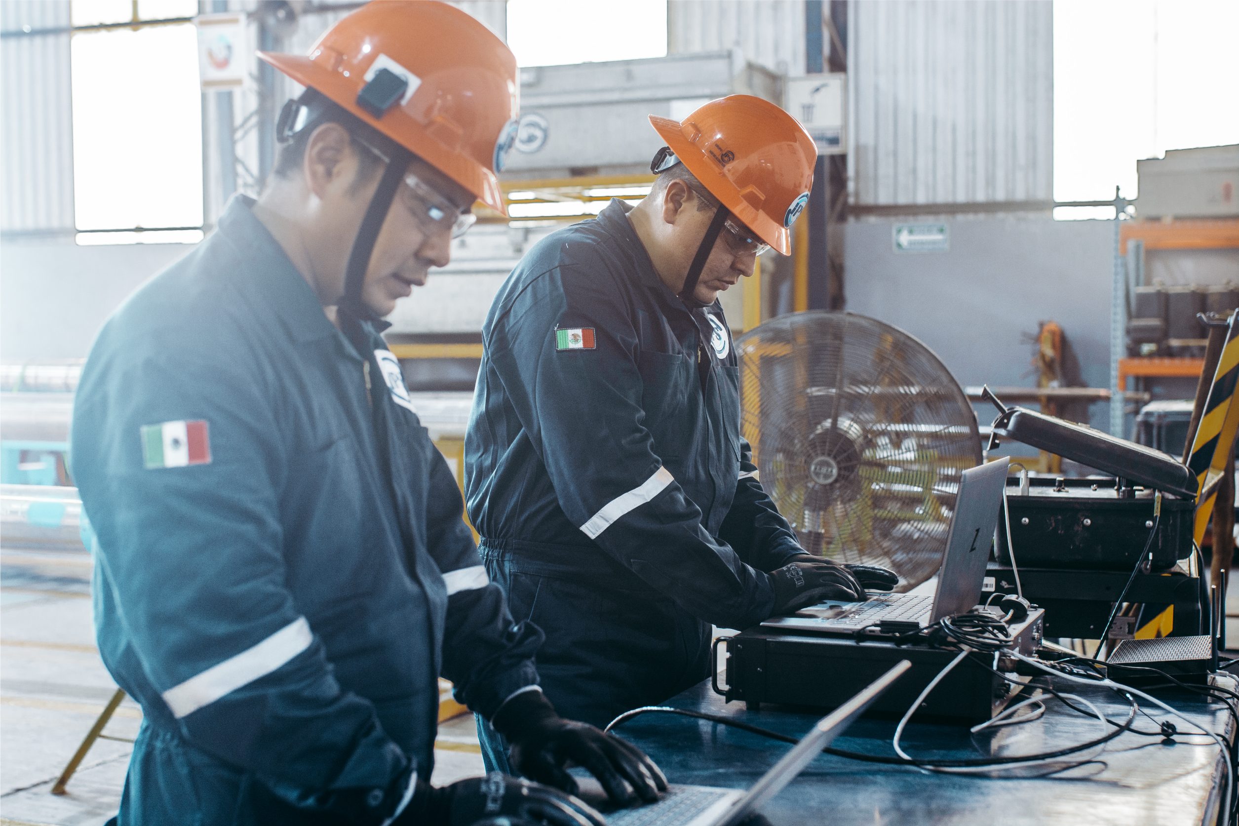 Engineers reviewing centralizer placement on a laptop