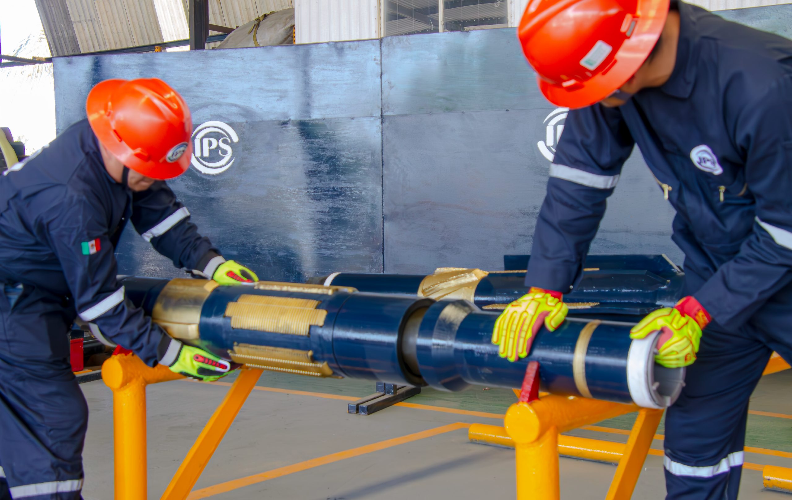 Crew handling a hole enlargement assembly