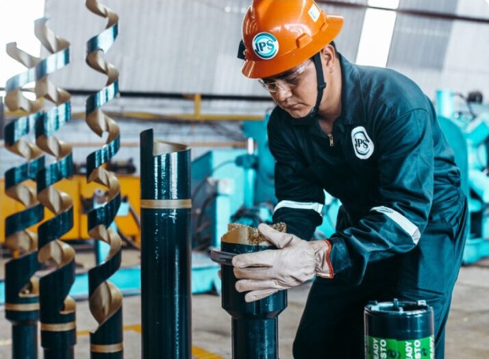 Technician handling a core sample
