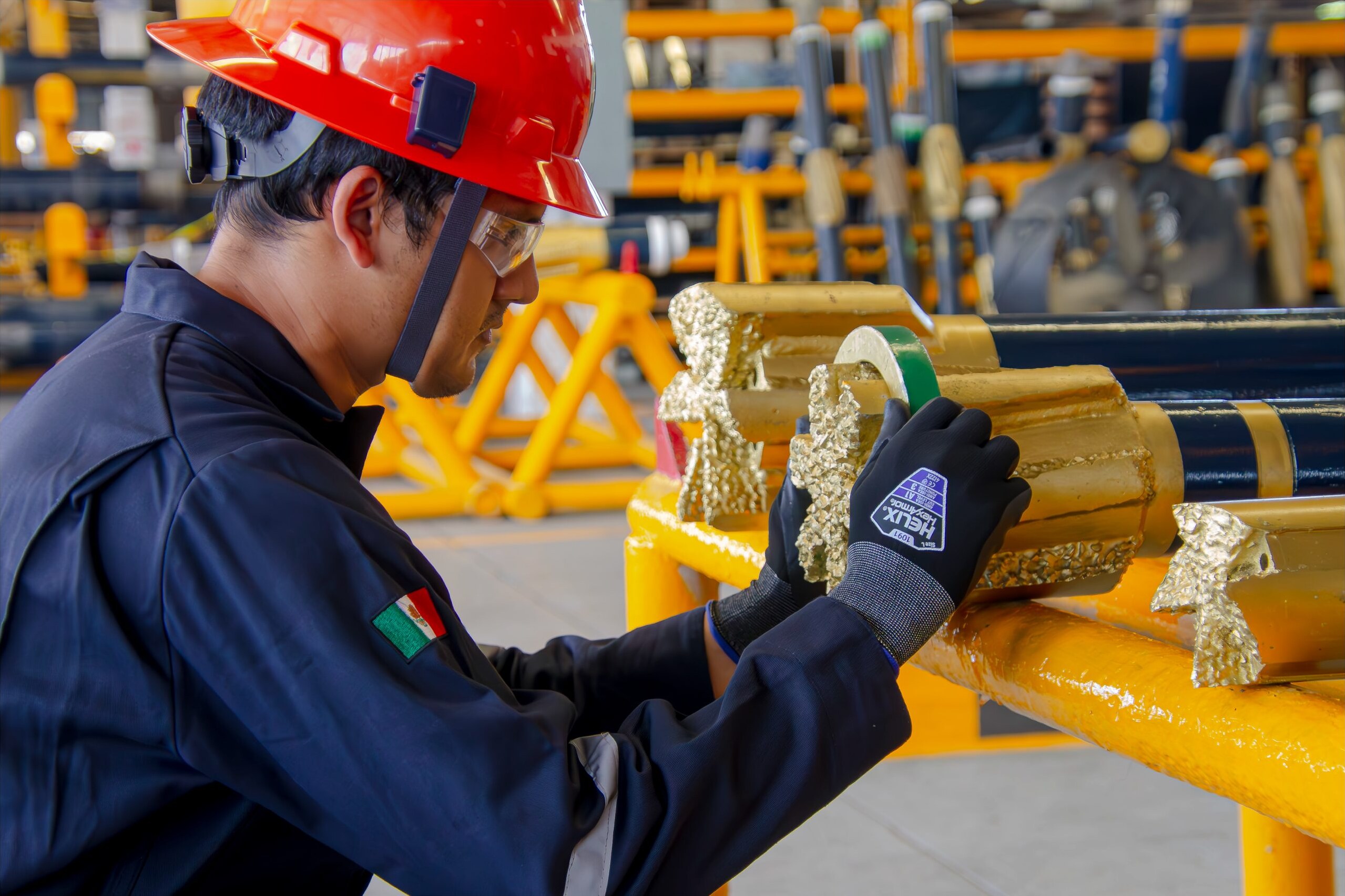 Technician torque-checking a drill bit