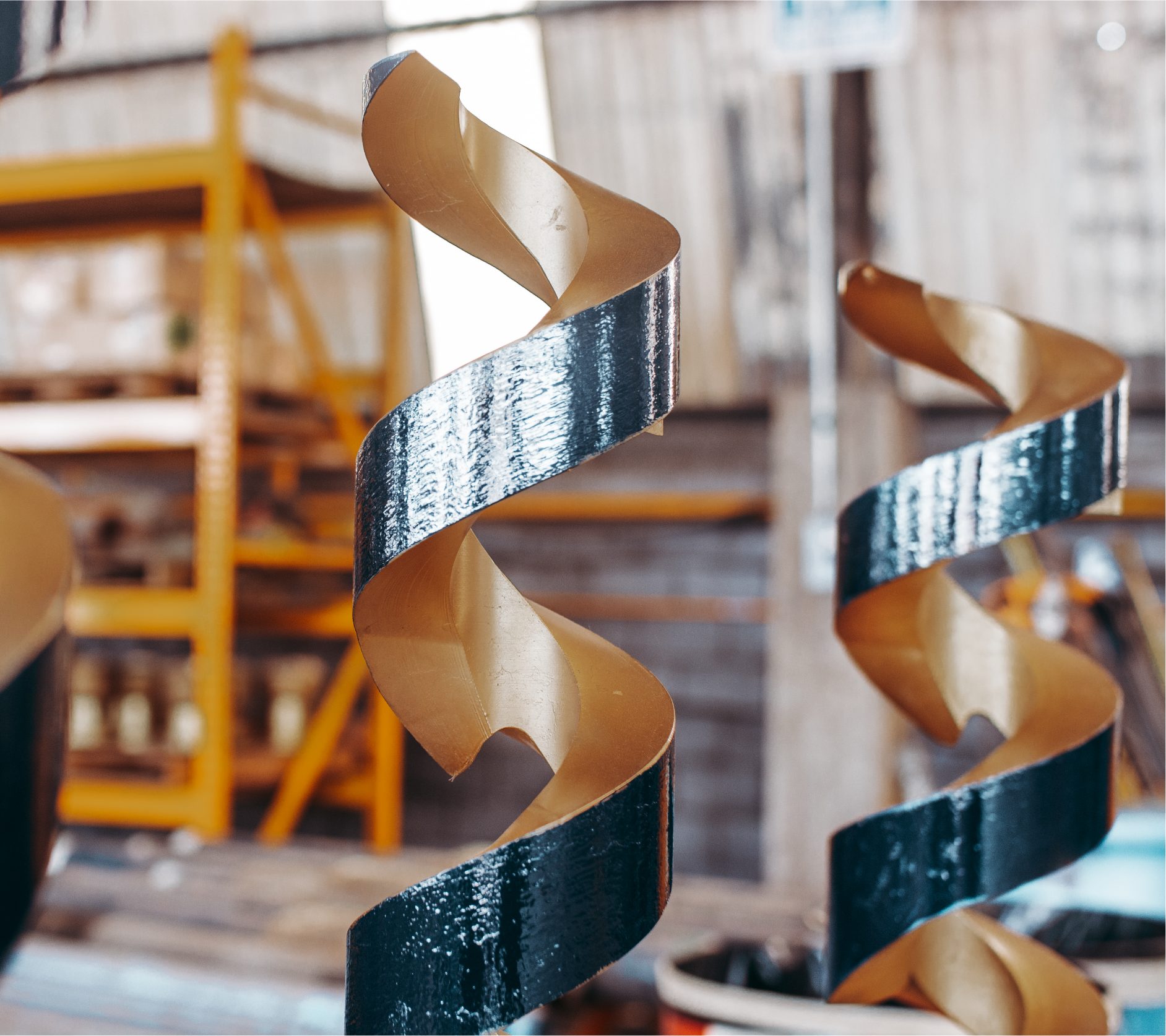 Spiral blade stabilizers standing in the workshop