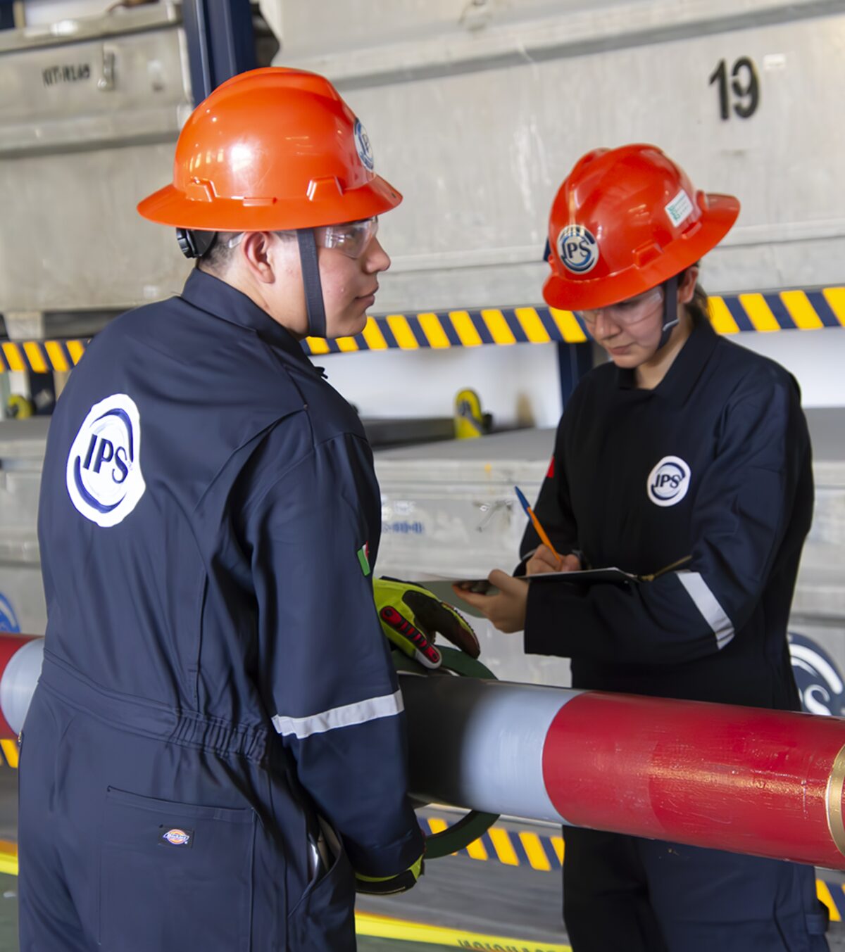 Technicians inspecting a Fortix motor