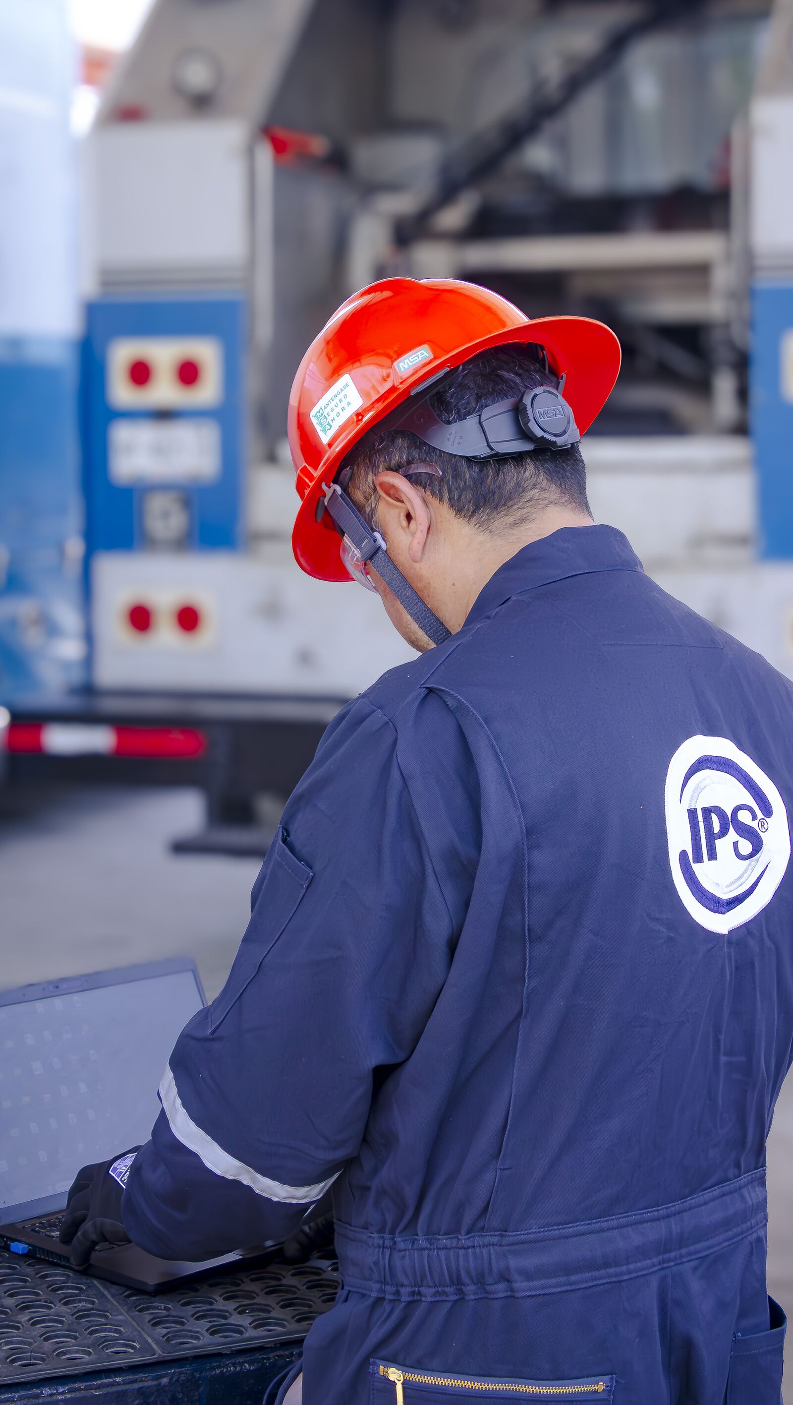 Technician programming a rotary steerable system on location